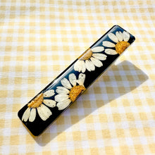 Load image into Gallery viewer, Black daisy bar hair clip