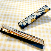 Load image into Gallery viewer, Black daisy bar hair clip