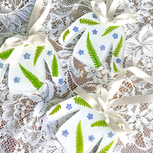 Load image into Gallery viewer, Forget-me-not fern white sweater ornament
