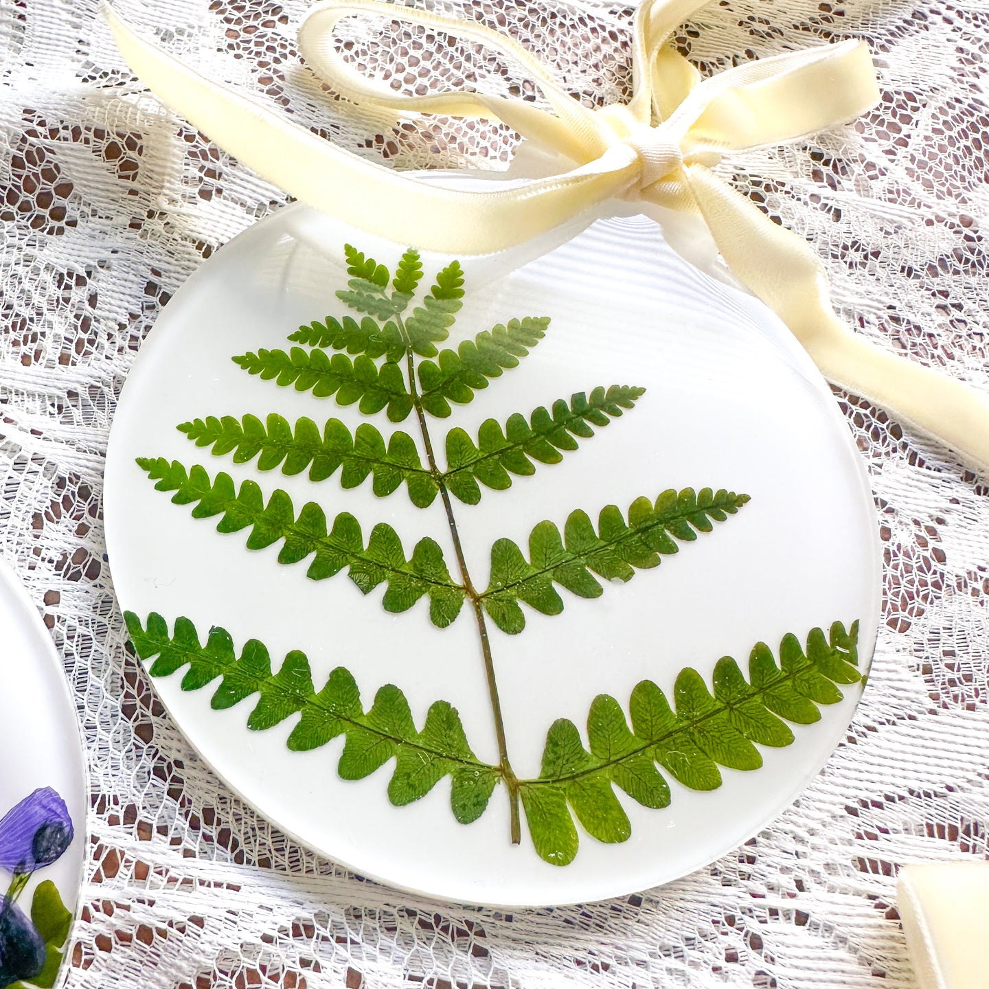 White fern circle ornament