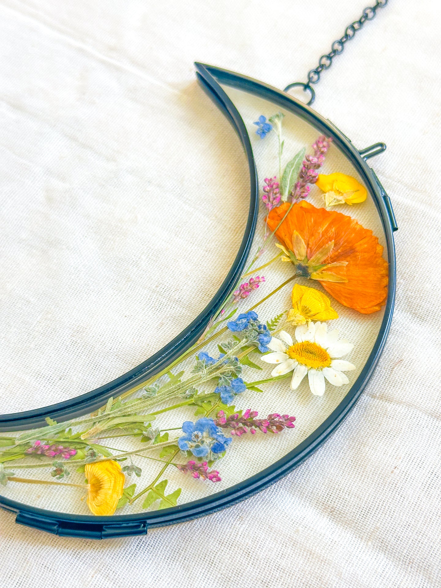 Black crescent moon wildflower garden wall hanging