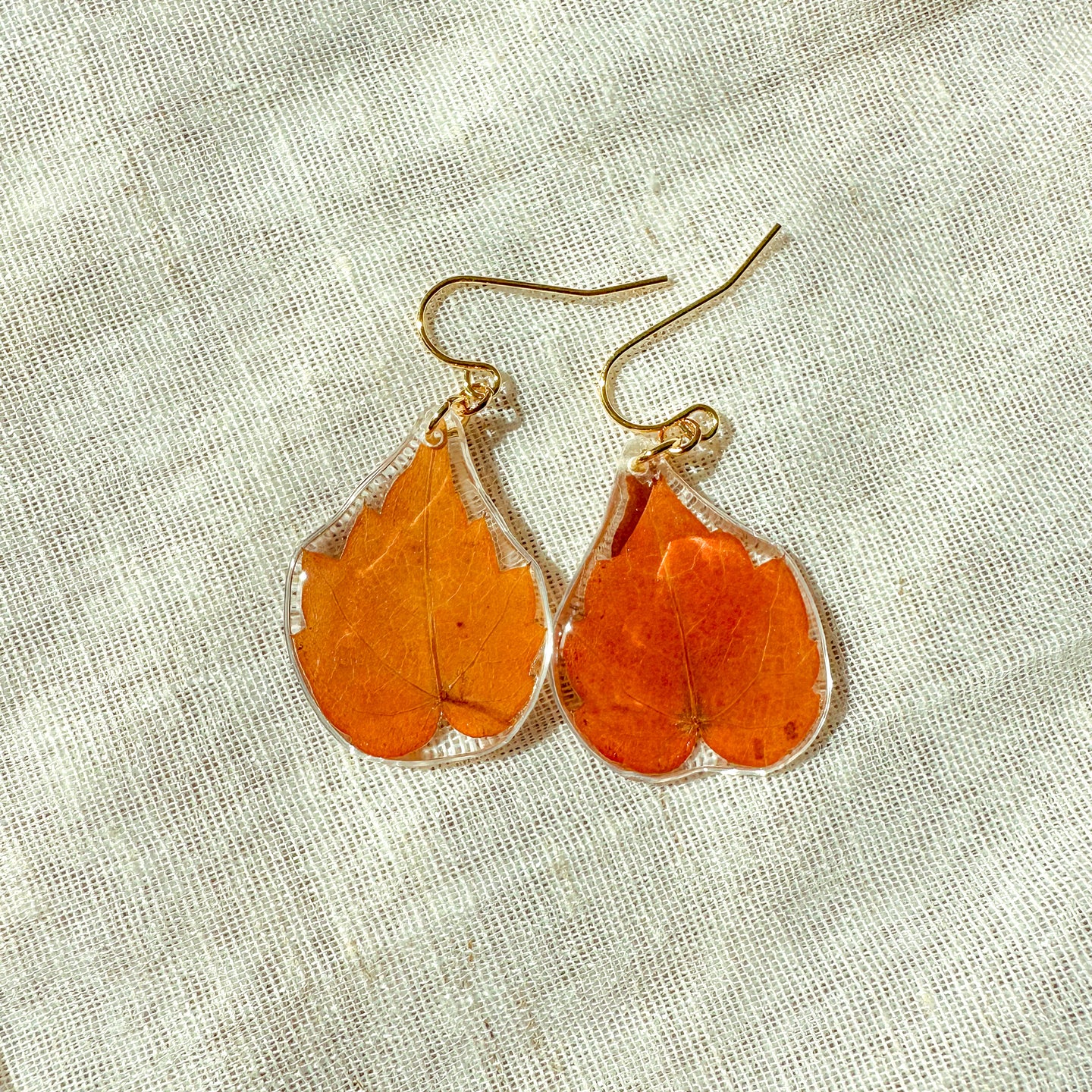 Orange ivy leaf earrings