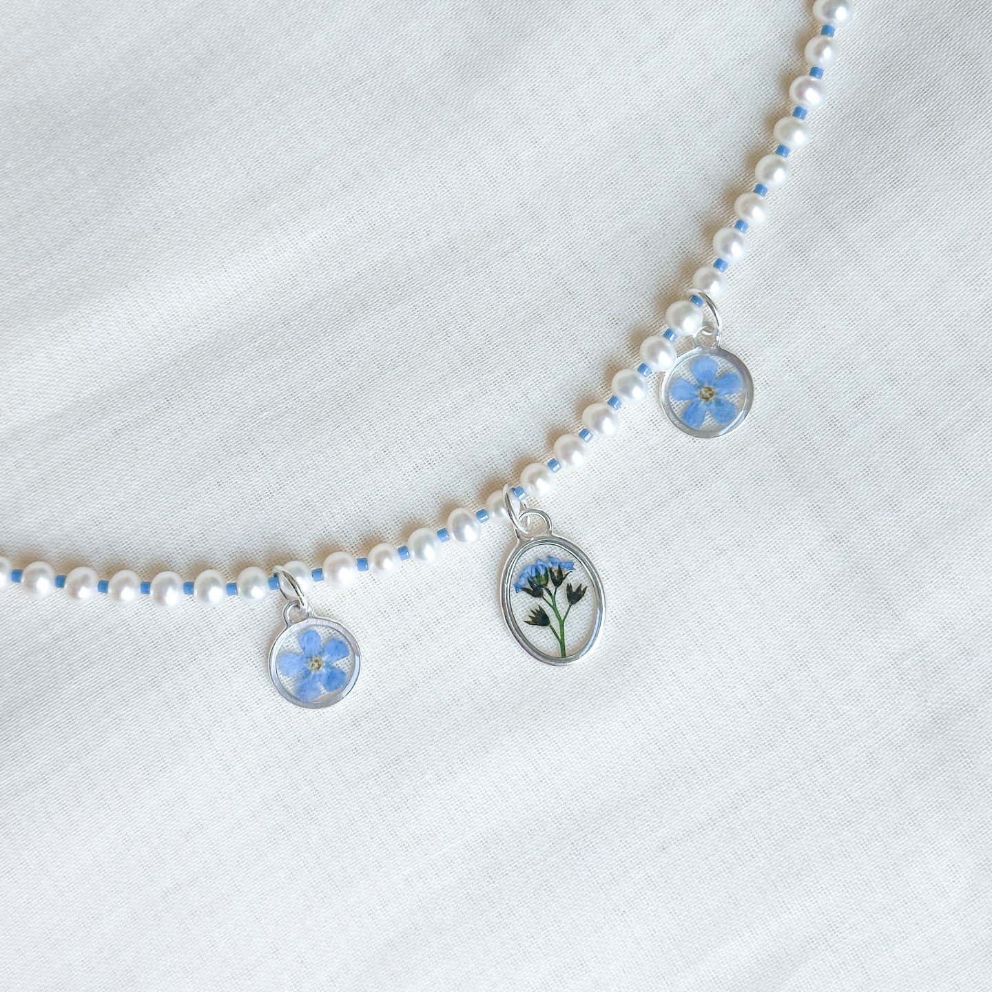Triple forget-me-not beaded charm necklace