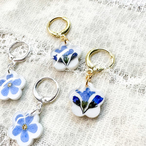 Forget-me-not white huggie hoops