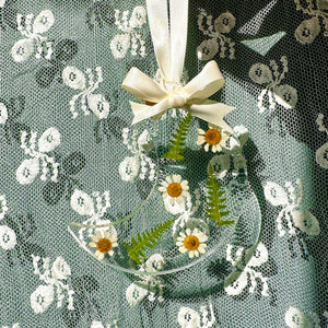 Daisy and fern crescent moon ornament