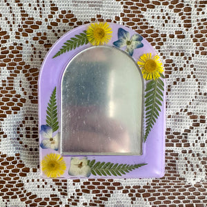 Purple and yellow pocket mirror