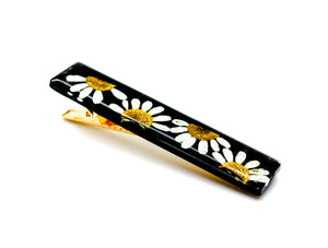Black daisy bar hair clip